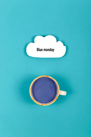 Sad blue Monday lettering with cloud and drinkの写真素材