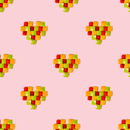 Heart in the technique of voxel art from fruits. Healthy food and vitamins concept