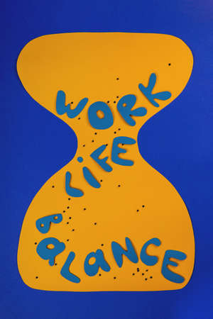 Work life balance concept. Hourglass. Time management to avoid stress.の写真素材