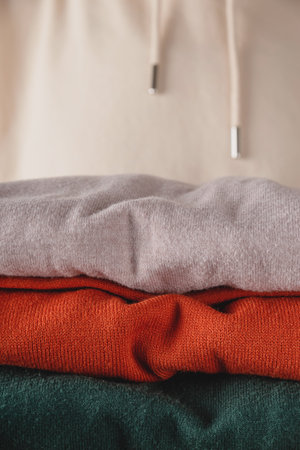 Stack of autumn basic womens turtlenecks in trendy colors. Minimalist basic wardrobe.の写真素材