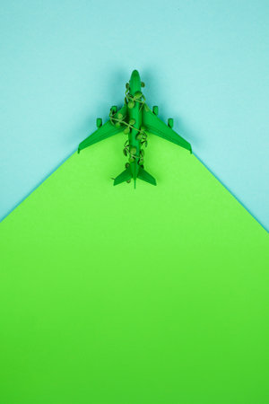 Sustainable aviation concept - green plane. Background with copy space.の写真素材
