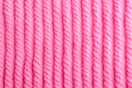 Pink knitted sweater texture background. AI generatedの素材