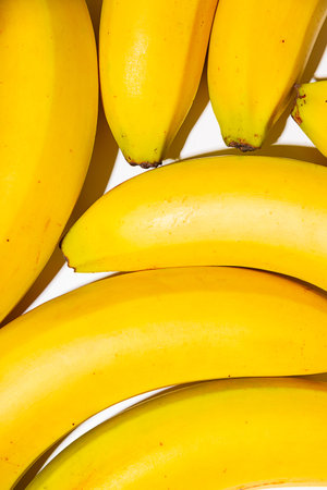Close up bananas texture background. Vibrant color.の写真素材