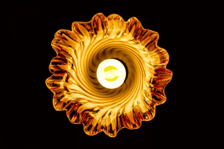 orange ceiling chandeliers with lampの写真素材