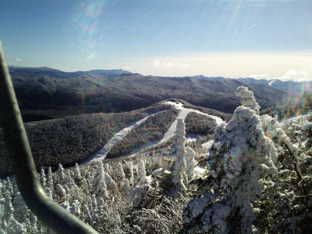 Snowy Ski Mountain with snow filled trees の写真素材