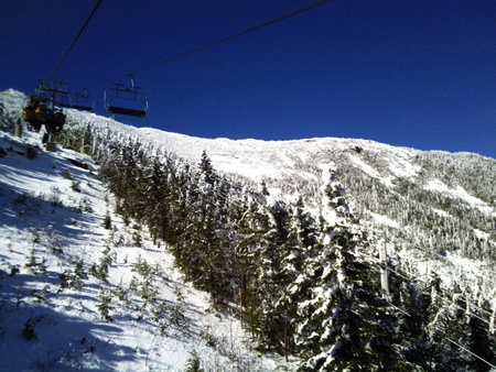 Ski Lift on Snow Covered Mountainの写真素材