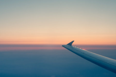 Beautiful Subtle Colors of the Sunset Taken through an Airplane Window