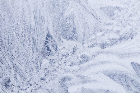 Frost pattern on winter window for background