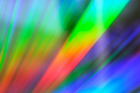 Color blurred spectrum of light on CDROM surface for backgroundの写真素材
