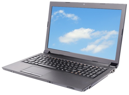 Laptop (notebook) with sky desktop wallpapers isolated on the whiteの写真素材