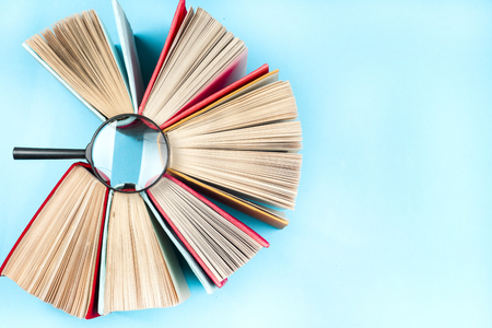 Top view of bright colorful hardback books in a circle.の写真素材
