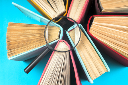 Top view of bright colorful hardback books in a circle.の写真素材