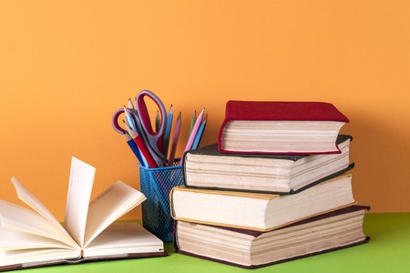 Open book, hardback bookson bright colorful background.の写真素材