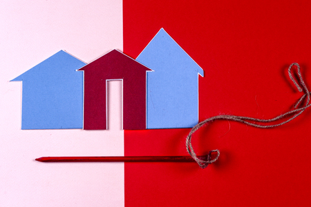 House and key on bright colorful backgroundの写真素材