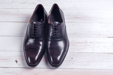 Male fashion with shoes on whiteの写真素材