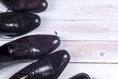 Male fashion with shoes on whiteの写真素材
