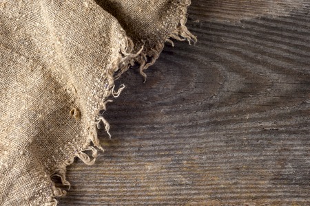 burlap hessian sacking on wooden backgroundの写真素材