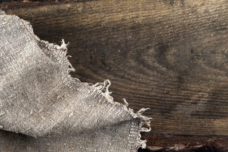 burlap hessian sacking on wooden backgroundの写真素材