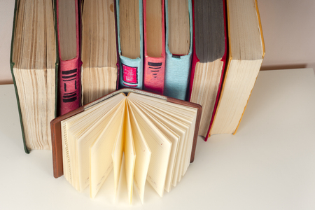 Open book, stack of colorful hardback books Back to school. . Education background.の写真素材