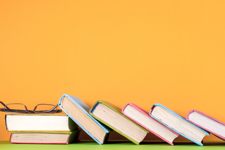 Set of colored books on bright colorful background. Back to schoolの写真素材