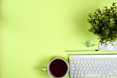 Office black desk table with white computer, supplies.の写真素材