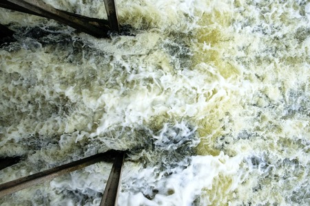 river water waves and bubbles.の写真素材