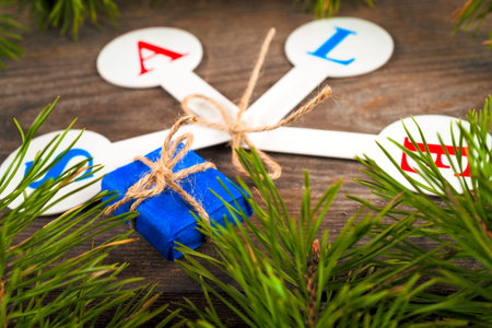 Red sale tags with inscription Sale on wooden background.