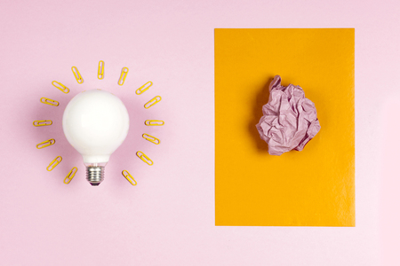 great idea concept with crumpled colorful paper and light bulbの写真素材