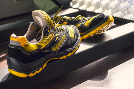 Unbranded modern sneaker in the gym. Black-Yellow. Comfortable shoes.の写真素材