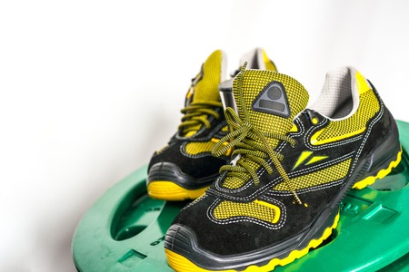 Unbranded modern sneaker in the gym. Black-Yellow. Comfortable shoes.の写真素材