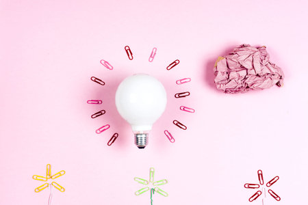 great idea concept with crumpled colorful paper and light bulb o