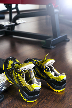 Unbranded modern sneaker in the gym. Black-Yellow. Comfortable shoes.の写真素材