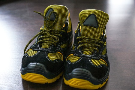 Unbranded modern sneaker in the gym. Black-Yellow. Comfortable shoes.の写真素材