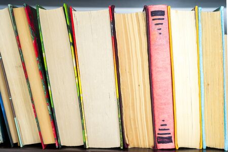 Set of books in the library. Knowledge, Science. Toned image.の写真素材