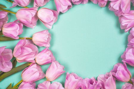 spring flowers banner - bunch of pink tulip flowers on bright colorful background. spring flowers.の写真素材
