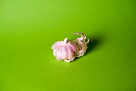 garlic isolated on bright background. Copy space for text.の写真素材