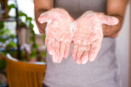 Washing hands rubbing with soap man for corona virus prevention, hygiene to stop spreading...