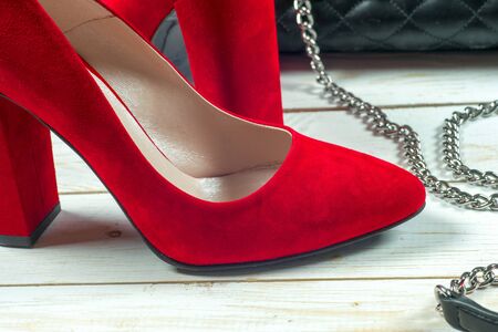 Red female shoes on high heels. Minimal fashion conceptの写真素材
