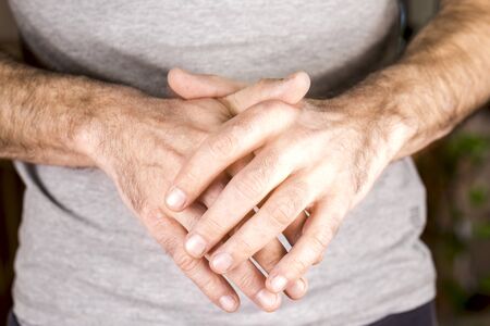 Man with hands togetherの写真素材