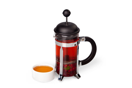 Cranberry tea with honey on white backgroundの写真素材