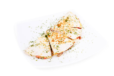 quesadilla with meat and vegetables on white bacgroundの写真素材