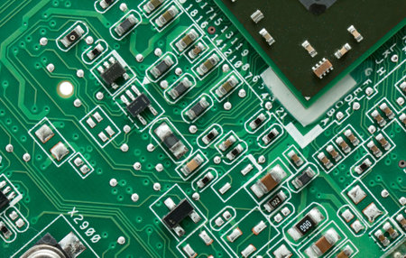Green circuit board with components