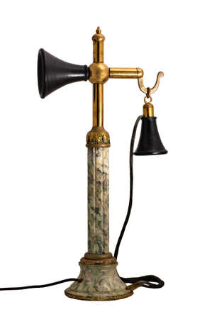 The ancient phone isolated on a white backgroundの写真素材