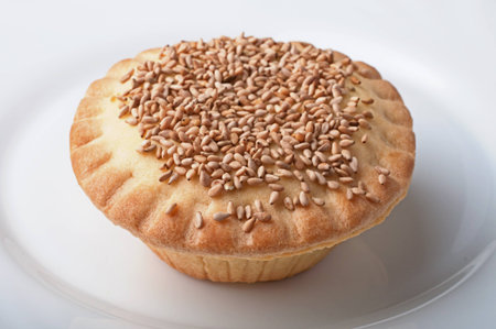 Confectionery product in the form of a fruitcake with seeds gingelliの写真素材