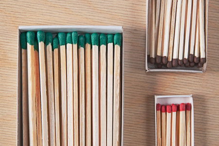 Matches of different length and thickness in different matchboxes