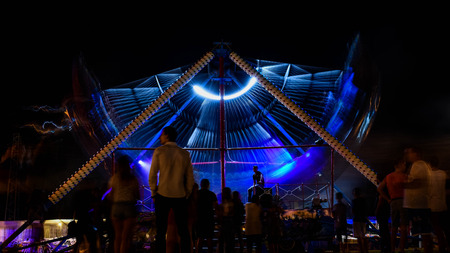 Fun Fair And Boat Ride Night Sceneのeditorial素材