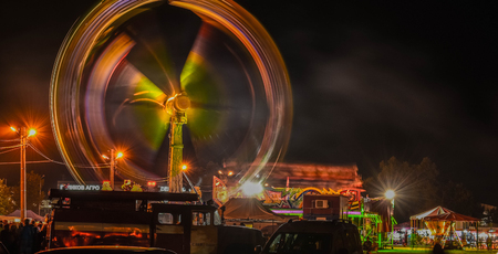 Fun Fair In Downtown Night Sceneのeditorial素材