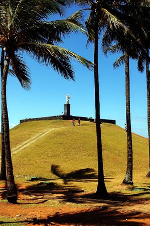 Hill with a statue of Christ in the topの写真素材
