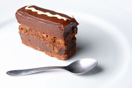Tasty piece of a Chocolate Cake in the plate .の写真素材
