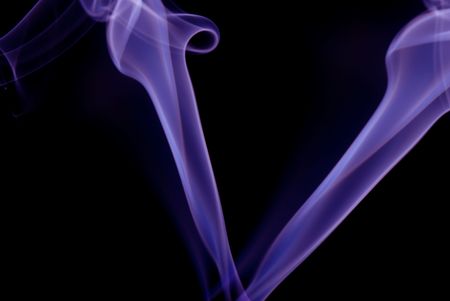 Purple V smoke on black backgroundの写真素材